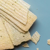 Chrupiąca przekąska śmietana i cebula, Nicolas Vahé